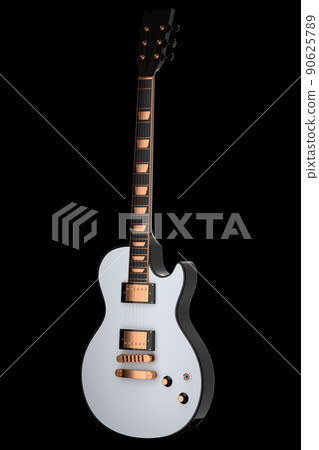 Close-up of Electric acoustic guitar isolated on black background. 90625789
