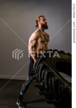 Fitness gym tire muscular wheel male strong man ABS training, concept exercise fit from power from young dedication, effort healthy. Barbell active arm, Fitness gym tire muscular wheel male strong man ABS training, concept exercise fit from power from young dedication, effort healthy. Barbell active arm, 90627015