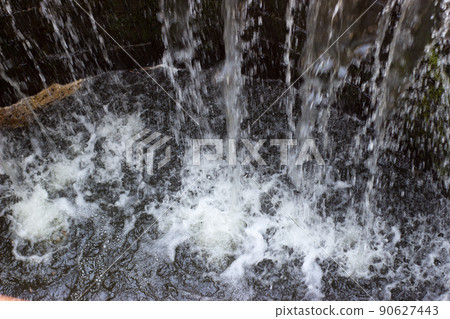 water falling into the fountain water falling into the fountain 90627443