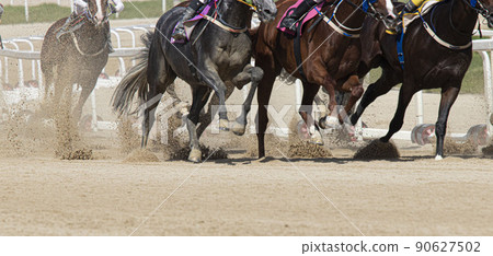 Racehorses, racing horses racing out of the village Racehorses, racing horses racing out of the village 90627502