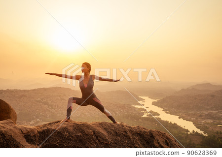 Yoga in Hampi temple copyspase at sunset.travel vacation copy spase lady with stylish jumpsuit Yoga in Hampi temple copyspase at sunset.travel vacation copy spase lady with stylish jumpsuit 90628369