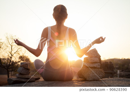 Yoga in Hampi temple copyspase at sunset.travel vacation copy spase lady with stylish jumpsuit Yoga in Hampi temple copyspase at sunset.travel vacation copy spase lady with stylish jumpsuit 90628390