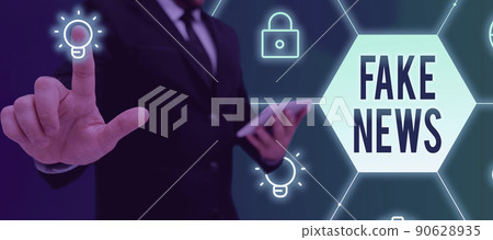 Conceptual display Fake News. Business showcase Giving information to showing that is not true by the media Businessman in suit holding open palm symbolizing successful teamwork. Conceptual display Fake News. Business showcase Giving information to showing that is not true by the media Businessman in suit holding open palm symbolizing successful teamwork. 90628935