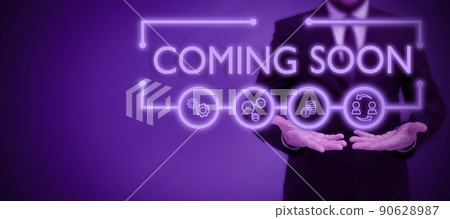Writing displaying text Coming Soon. Business idea something is going to happen in really short time of period Businessman in suit holding notepad symbolizing successful teamwork. Writing displaying text Coming Soon. Business idea something is going to happen in really short time of period Businessman in suit holding notepad symbolizing successful teamwork. 90628987