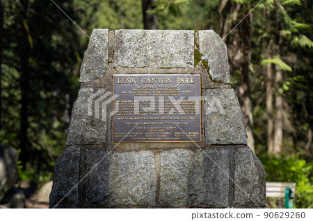 North Vancouver, BC, Canada - April 20 2021 : Monument of Lynn Canyon Park. North Vancouver, BC, Canada - April 20 2021 : Monument of Lynn Canyon Park. 90629260