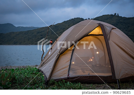 Camp Solo Tent Rough Camp Back View Sea Copy Space Lamp Lights Dusk Night Camp 90629685