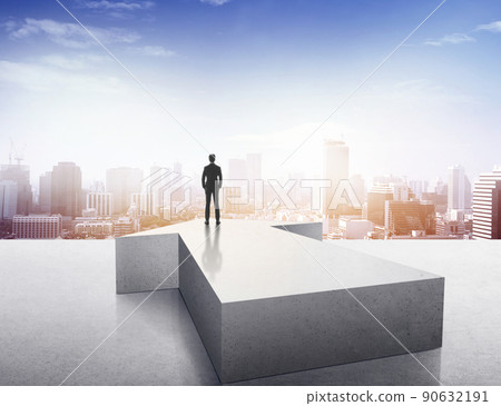 Vision concept. Successful businessman standing on arrow and looking over city 90632191