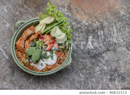 Traditional stir fried spicy Asian Redtail Catfish (Hemibagrus wyckioides) or Kang catfish with red curry paste. Traditional stir fried spicy Asian Redtail Catfish (Hemibagrus wyckioides) or Kang catfish with red curry paste. 90632513