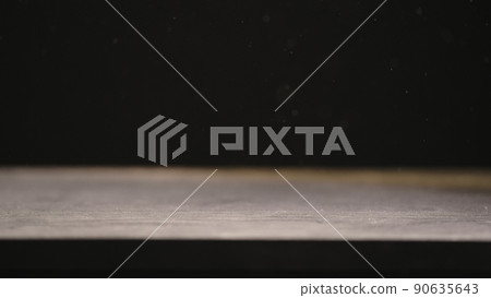 dust fall on wood table backlit by sun dust fall on wood table backlit by sun 90635643