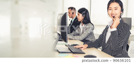 Business people wearing headset working in office broaden view Business people wearing headset working in office broaden view 90636101