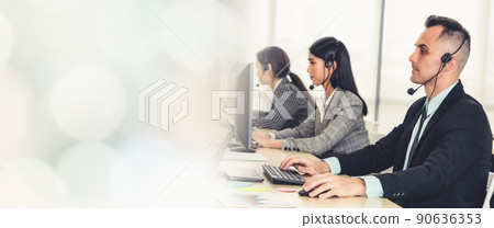 Business people wearing headset working in office broaden view Business people wearing headset working in office broaden view 90636353