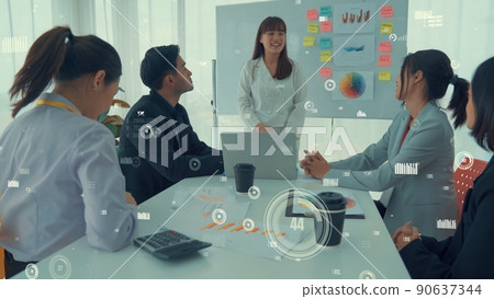 Business people in corporate staff meeting with envisional graphic Business people in corporate staff meeting with envisional graphic 90637344