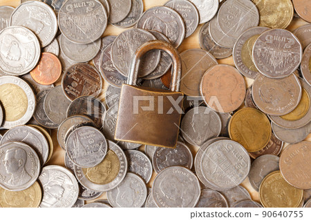 Coin money (Thai BAHT) and lock. Saving and financial security concept.finance, economy concept. Coin money (Thai BAHT) and lock. Saving and financial security concept.finance, economy concept. 90640755