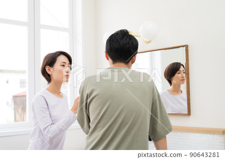 A couple checking for tooth problems A couple checking for tooth problems 90643281