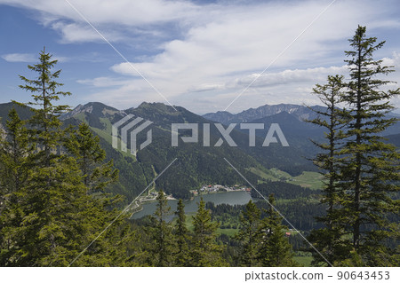 Hiking in Bavaria with view of Spitzingsee lake 90643453