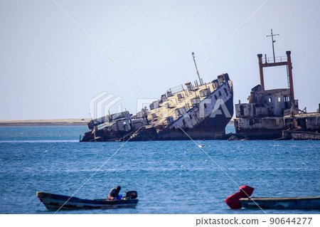 Old, Rusted and Colorful Fishing Boats and Ships in the Somalian Berbera Port Old, Rusted and Colorful Fishing Boats and Ships in the Somalian Berbera Port 90644277