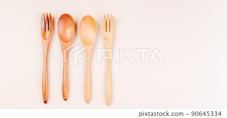 Set of eco friendly bamboo eating ,wooden cutlery.Zero waste traveling set.Wooden cutlery for reusable use.Environmental protection concept.made of natural materials.Plastic free.Sustainable lifestyle 90645334
