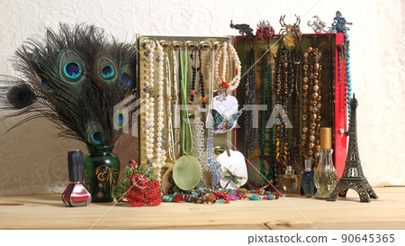 Jewelry Box Made From Old Candy Tin and Magnetic Hooks on Dressing Table Jewelry Box Made From Old Candy Tin and Magnetic Hooks on Dressing Table 90645365