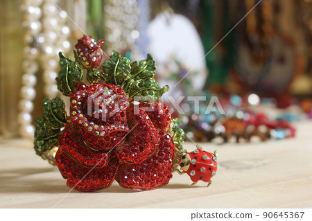 Vintage Rhinestone Rose Bracelet With Jewelry Box in Background 90645367