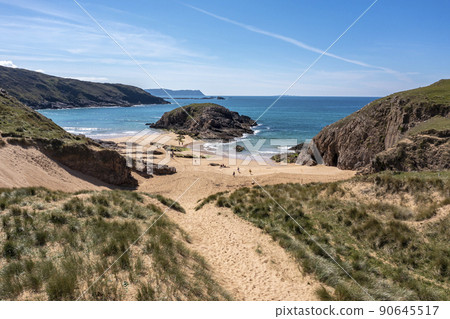 Aerial view of the Murder Hole beach, officially called Boyeeghether Bay in County Donegal, Ireland 90645517