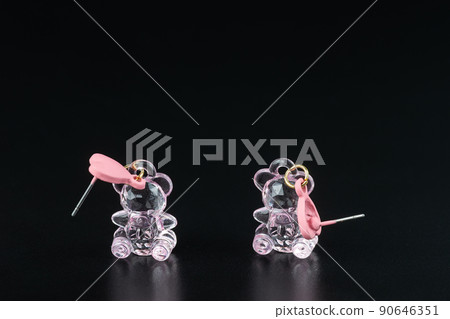 Jewelry earrings and costume jewelry on a black background Jewelry earrings and costume jewelry on a black background 90646351