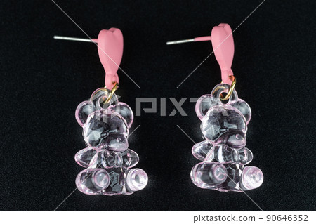 Jewelry earrings and costume jewelry on a black background Jewelry earrings and costume jewelry on a black background 90646352