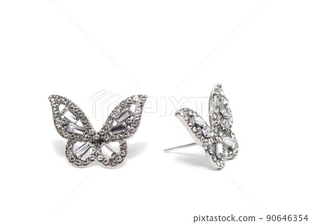 Earrings isolated on white background. Concept of fashion. 90646354