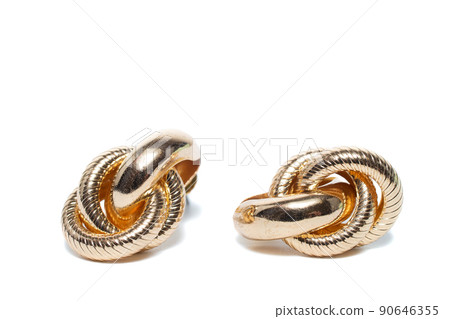 Earrings isolated on white background. Concept of fashion. 90646355