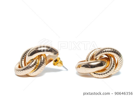 Earrings isolated on white background. Concept of fashion. Earrings isolated on white background. Concept of fashion. 90646356