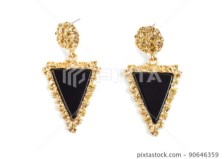 Earrings isolated on white background. Concept of fashion. 90646359