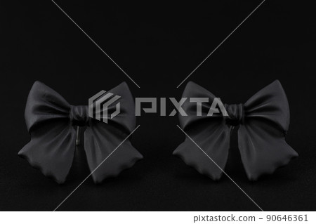 Jewelry earrings and costume jewelry on a black background Jewelry earrings and costume jewelry on a black background 90646361