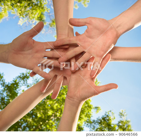 volunteers people hands together outdoors 90646566