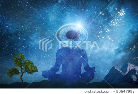silhouette of man practicing meditation outdoors in night under starry sky 90647992