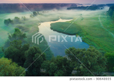 Early misty morning, sunrise over the lake. Rural landscape in summer. Aerial view Early misty morning, sunrise over the lake. Rural landscape in summer. Aerial view 90648935
