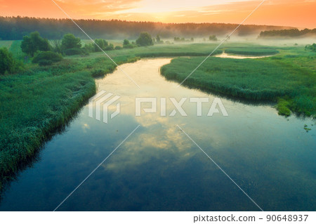 Early misty morning, sunrise over the lake. Rural landscape in summer. Aerial view Early misty morning, sunrise over the lake. Rural landscape in summer. Aerial view 90648937