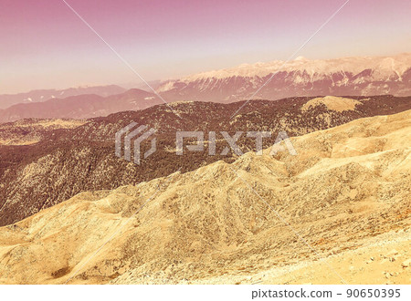 sandy mountains with green plants. mounds of white sand, huge mountains. tourism to a warm country with high sand dunes sandy mountains with green plants. mounds of white sand, huge mountains. tourism to a warm country with high sand dunes 90650395