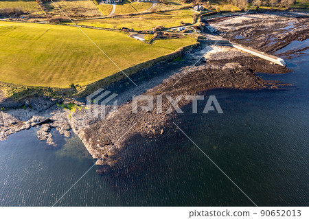 Aerial view of the amazing rocky coast at Ballyederland by St Johns Point in County Donegal - Ireland. Aerial view of the amazing rocky coast at Ballyederland by St Johns Point in County Donegal - Ireland. 90652013