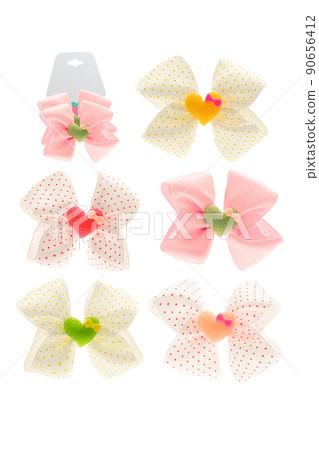 Kit, set of colorful of satin bow hair for girl, woman isolated on white background. Scrunchie hair clip accessory for girls and women. Pastel colors. Close up 90656412