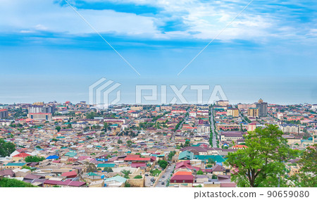 top view of the historical quarters magals and the Caspian Sea in the distance from the wall of the citadel to the city of Derbent top view of the historical quarters magals and the Caspian Sea in the distance from the wall of the citadel to the city of Derbent 90659080