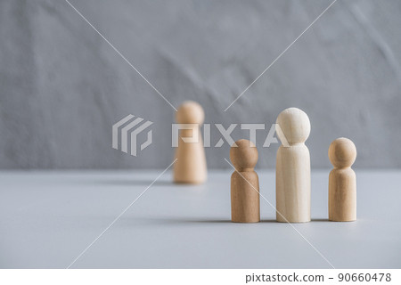 ingle father with two children. wife behind them. Divorce and breaking of relations. Concept made from wooden men people ingle father with two children. wife behind them. Divorce and breaking of relations. Concept made from wooden men people 90660478