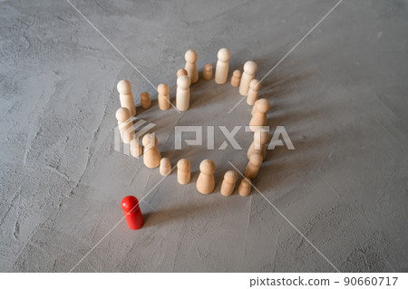 People stand in a heart on a gray concrete background. Wooden figures of people. Communication. partnership, friendship, group. Business team, teamwork, team spirit. People stand in a heart on a gray concrete background. Wooden figures of people. Communication. partnership, friendship, group. Business team, teamwork, team spirit. 90660717