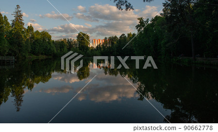 a lake in the woods late in the evening a lake in the woods late in the evening 90662778