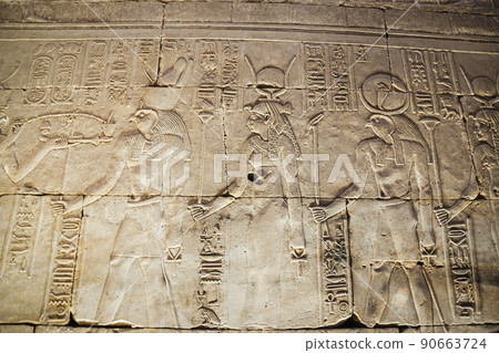 Bas-reliefs of the ancient Temple of Horus in Edfu, Egypt 90663724