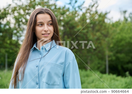 Outdoor portrait of a beautiful teenage girl 15 years old 90664664