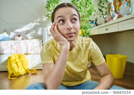 Teenage female student having video call, looking at webcam Teenage female student having video call, looking at webcam 90665034