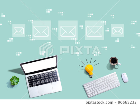 Email concept with computers with a light bulb Email concept with computers with a light bulb 90665232