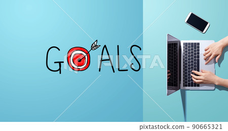 Goal concept with person working with laptop Goal concept with person working with laptop 90665321
