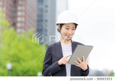 A woman wearing a helmet A woman wearing a helmet 90665953