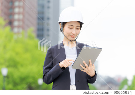 A woman wearing a helmet A woman wearing a helmet 90665954