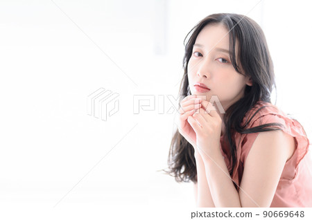 There is a copy space for a woman looking at the front 90669648